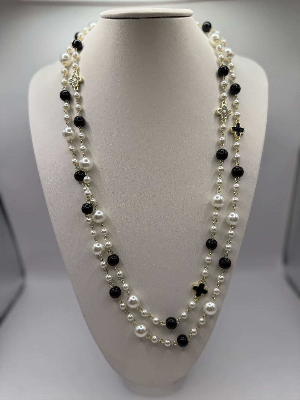 Elegant Black and White Pearl Station Long Necklace with 2 sided clovers